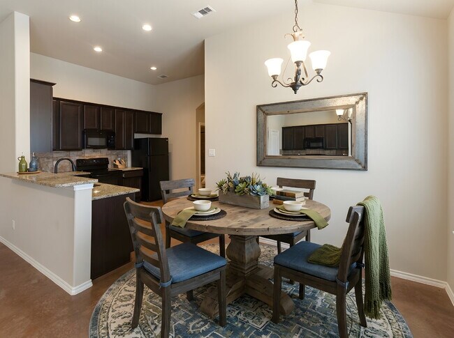 Building Photo - 3 Bedroom Duplex with Stained Concrete Floors and Greenbelt Views!