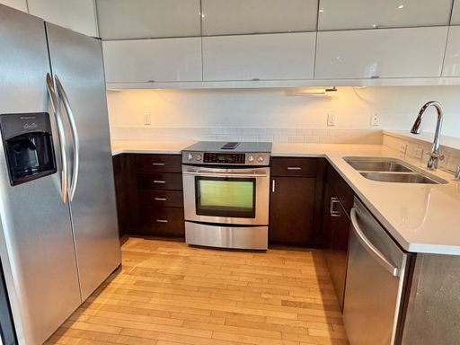 Building Photo - Industrial-Style Queen Anne Townhome with water views on every floor! AVAILABLE NOW!