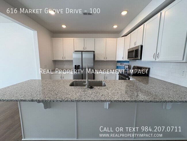 Building Photo - 616 Market Grove Drive-100