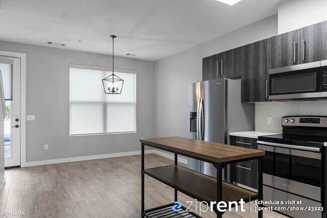 Building Photo - 2 br, 2.5 bath Townhome - 7805 Cooper Lane...