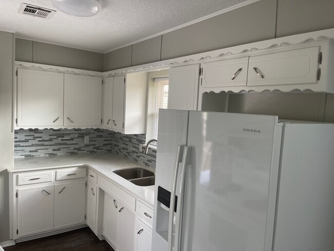 Building Photo - 3 bedroom PLUS floor plan! Newly Remodeled...