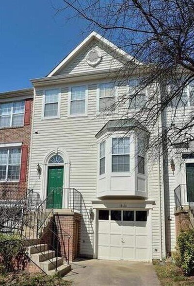 Outside, front of townhouse - 14614 Stream Pond Dr