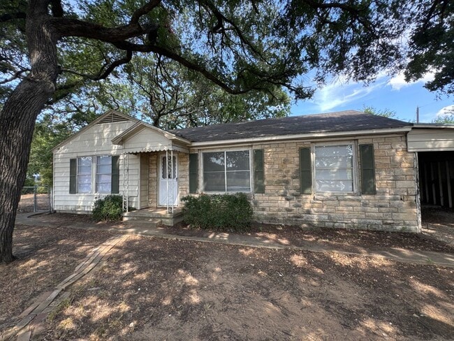 Building Photo - Denton Charmer with Big Yard, Carport & Flexible Living Space