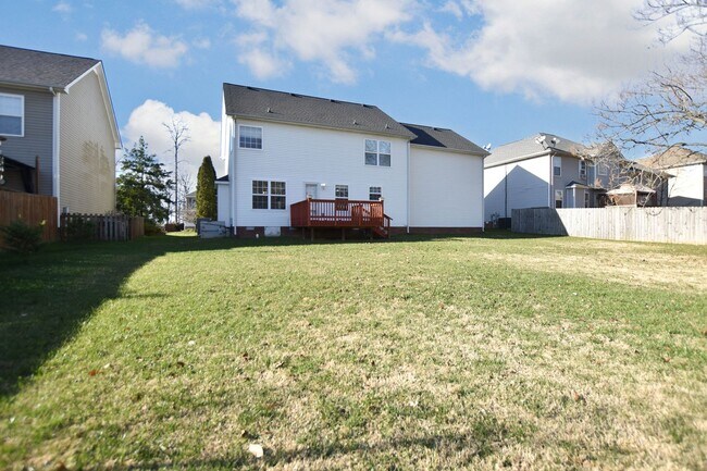 Building Photo - Pet Friendly Three Bedroom with Bonus!