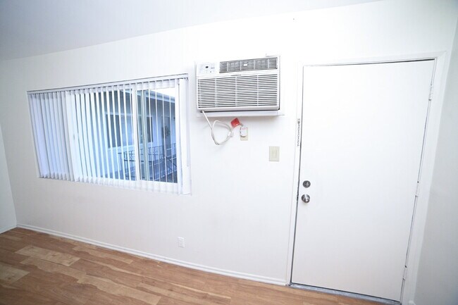 Building Photo - Newly remodeled studio in a gated building...