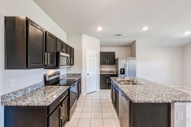 Building Photo - 9705 Kensley Rose Dr