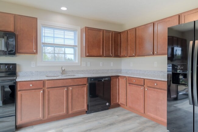 Building Photo - More units and move-in options available.