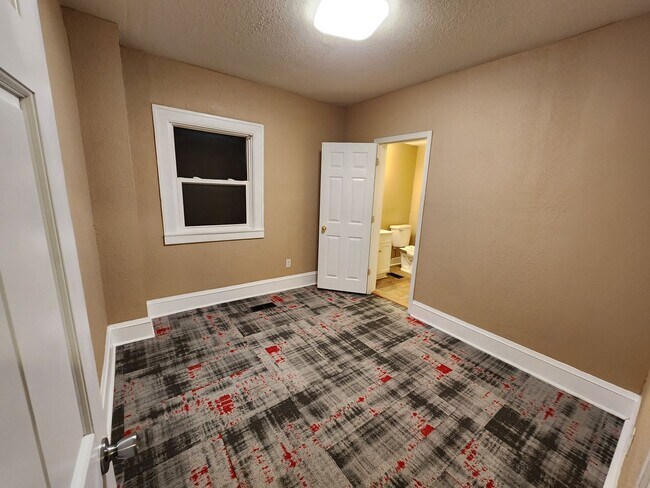 Building Photo - 4 Bedroom, 2 Bathroom home with large yard...