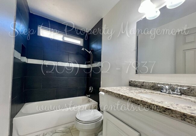 Building Photo - Beautifully Updated 4-Bedroom Home on Half...