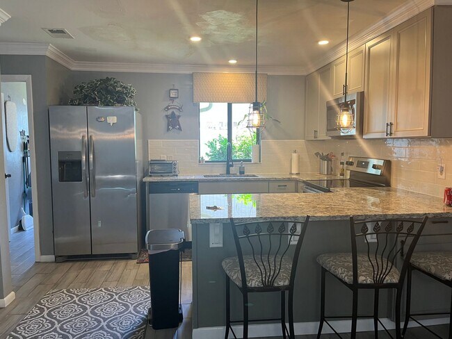 Building Photo - Fully Furnished 3-Bedroom Home in Palm Coa...