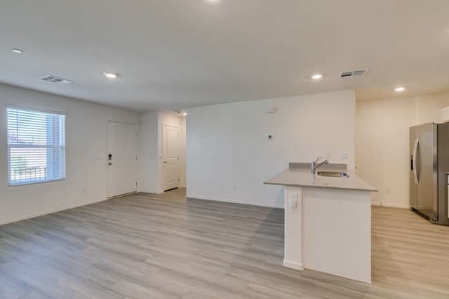 Building Photo - Gorgeous Townhome with upgrades in gated community* 3 large bedrooms, 2 car garage*Community pool...