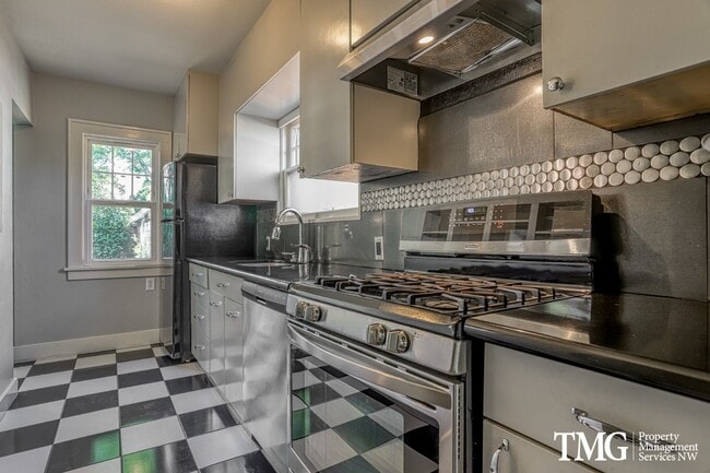 Building Photo - Updated 1928 Tutor w/ Original Touches and Large Fully Fenced Back Yard