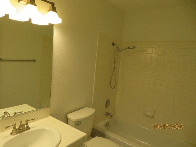 Building Photo - Clean well-maintained upstairs Condo, Gated Community