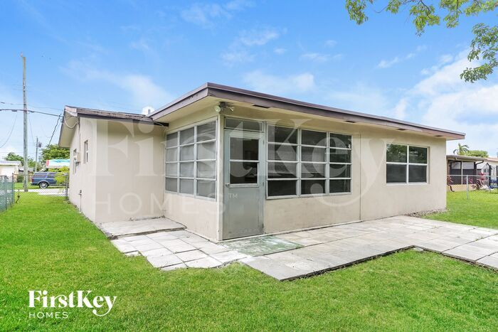 Building Photo - 6891 NW 25th Ct