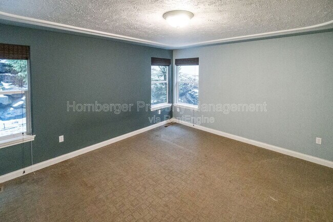 Building Photo - 6415 S Woodland Ct