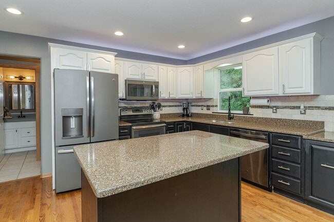 Building Photo - Spacious Home With Finished Basement And 3 Car Garage