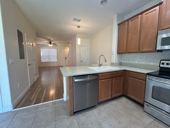 Building Photo - Charming Sawgrass Village Townhome with Pond Views & Modern Comfort