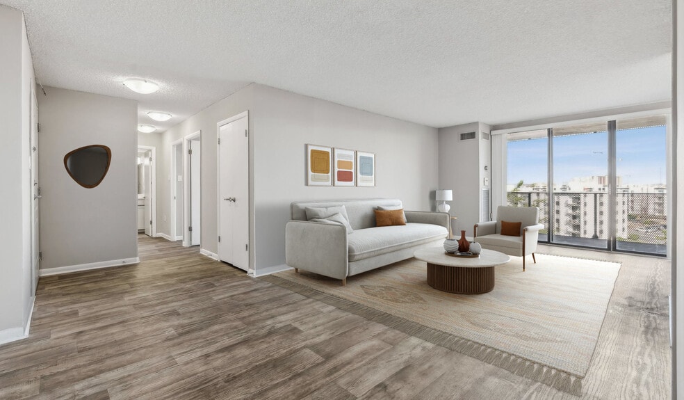 Spacious living room with ample natural light - The Summit