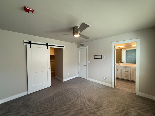 Building Photo - Modern Townhouse with Rooftop Deck & Mountain Views Near Sloan’s Lake!!