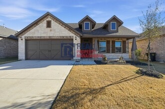 Building Photo - Inviting 3-Bedroom Home with Covered Patio
