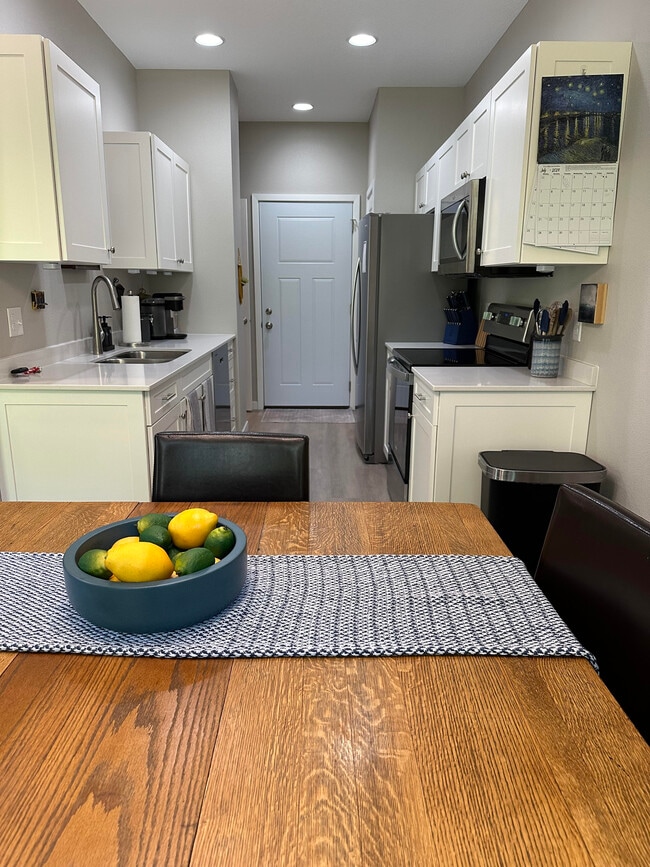 DIning room and kitchen - 4302 Spruce Creek Dr