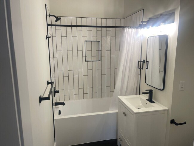 Building Photo - Brand new 2 bed/2 bath, central a/c, dishwasher, washer & dryer, deck & patio!