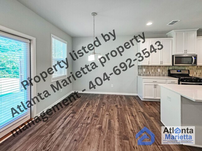 Building Photo - Spacious & Stylish 4BR/3.5BA Townhome Near...