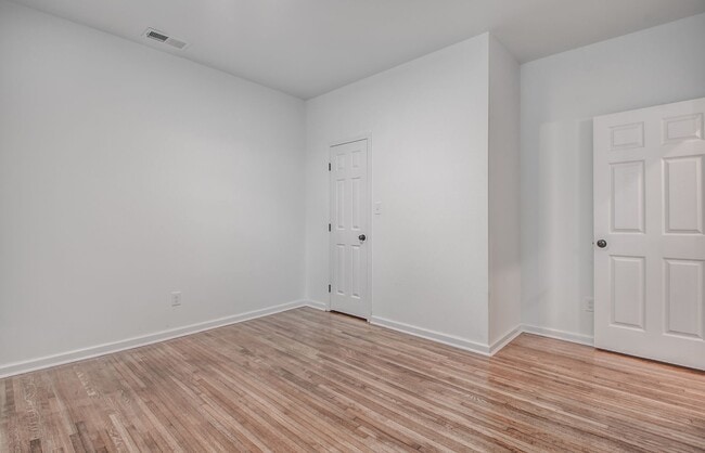Building Photo - Live Stylishly. Live Comfortably. Live Mem...
