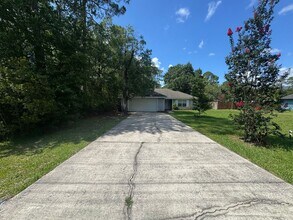 Building Photo - Ready Now! 3/2 Single Family Home w/ Fenced Yard in Starke, FL!