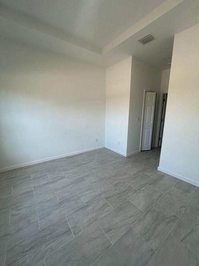 Building Photo - JUST BUILT! Spacious 4/2/2 Home -Perfect for Your Family in SW Lehigh Acres