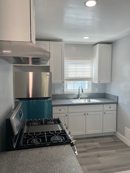 new refrigirator, the the plastic cover will be removed - 2293 Grand Ave