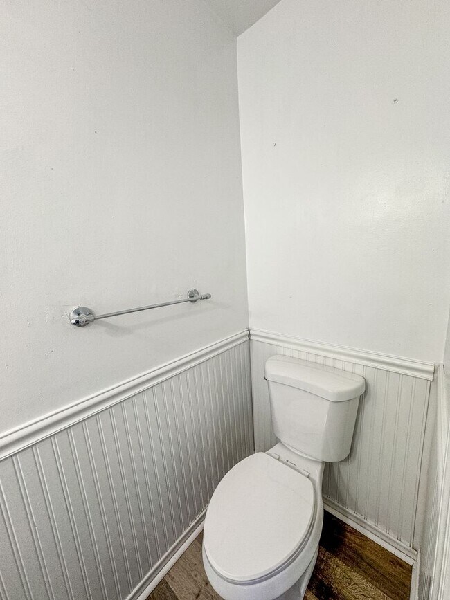 Building Photo - Introducing our spacious townhouse located...