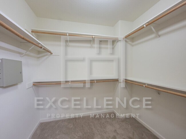 Building Photo - Spacious 3/2.5 Located In Communication Hills, With Two 1 Car Garages, W/D & Large Master Retreat