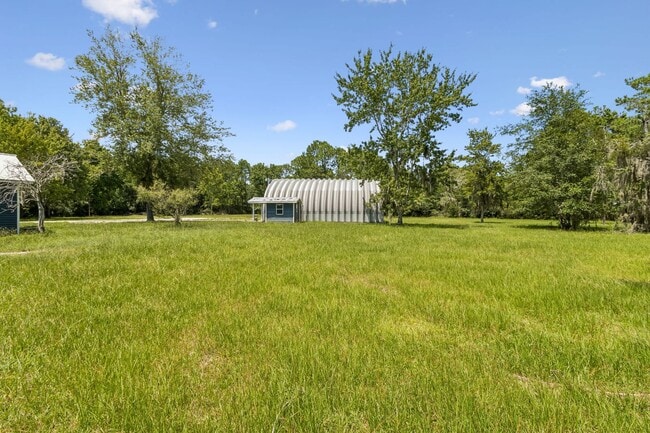 Building Photo - Cottage on 3 Acres with Massive Workshop & Storage