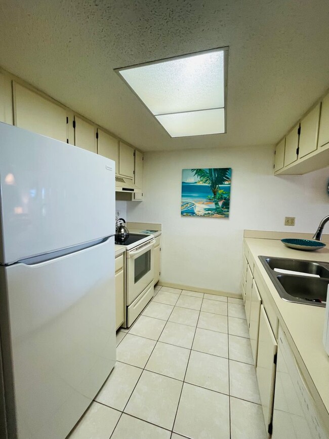 Building Photo - **TALA LAKES-55YR COMMUNITY**