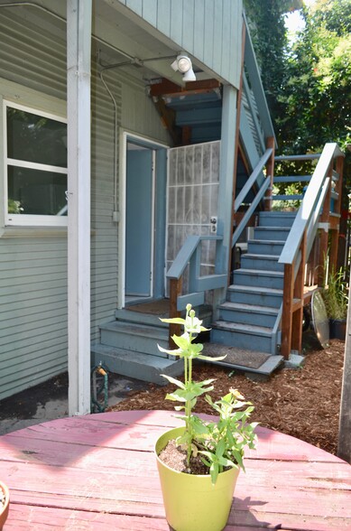 back door and steps to upper apartment - 568 Merrimac St