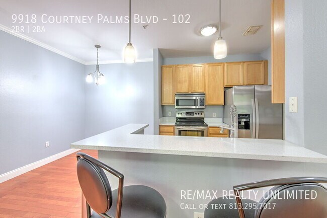 Building Photo - 9918 Courtney Palms Blvd
