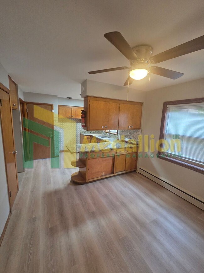 Building Photo - Spacious 6-Bedroom Home with Finished Basement and Backyard