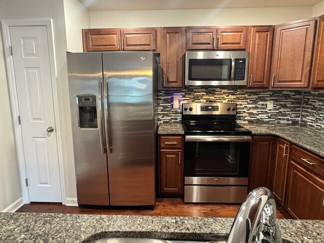 Building Photo - Beautiful, Conveninetly located First Floor Condo