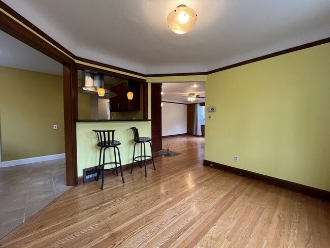 Building Photo - Classic Brick Portland Home on Stark Street with Dual Living Areas and Two Full Kitchens