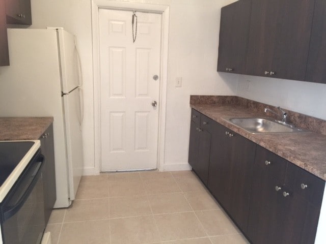 KITCHEN CABINETS WITH GRANITE AND HIGH EFFICIENCY APPLIANCES - Edge Apartments