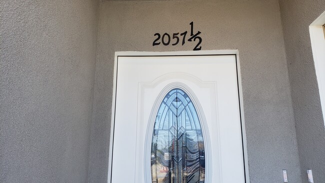 Building Photo - 2057 W Florence Ave