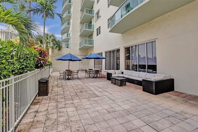 Building Photo - 19390 Collins Ave