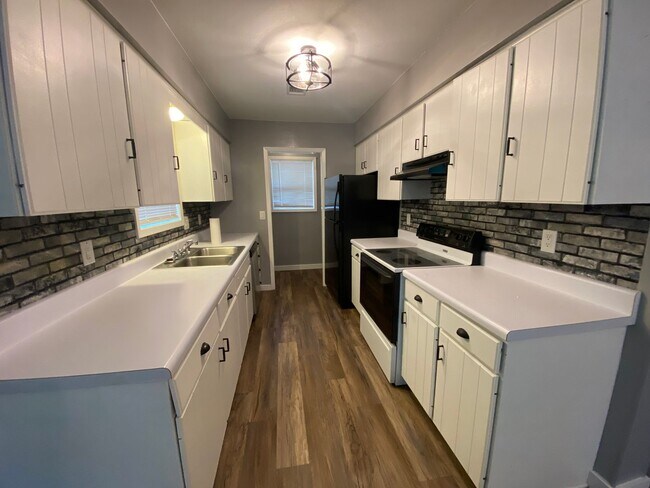 Building Photo - Cozy Remodeled 3 Bedroom home on Shaded lot with Shop!