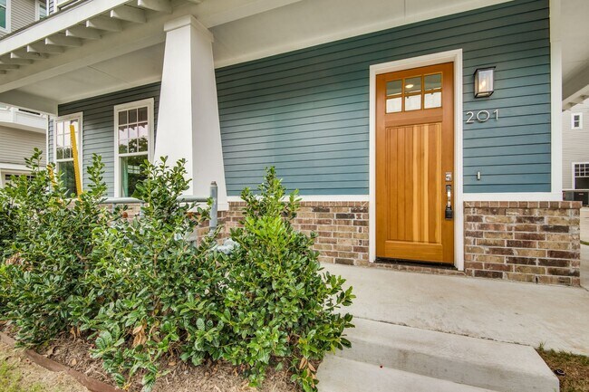 Building Photo - Welcome to a beautiful Craftsman-style Tow...