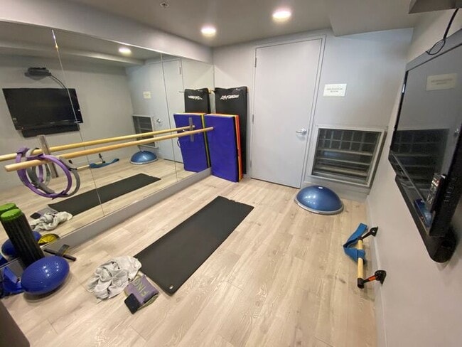 Building Photo - Live at The Axis High-Rise! Upscale, Urban...