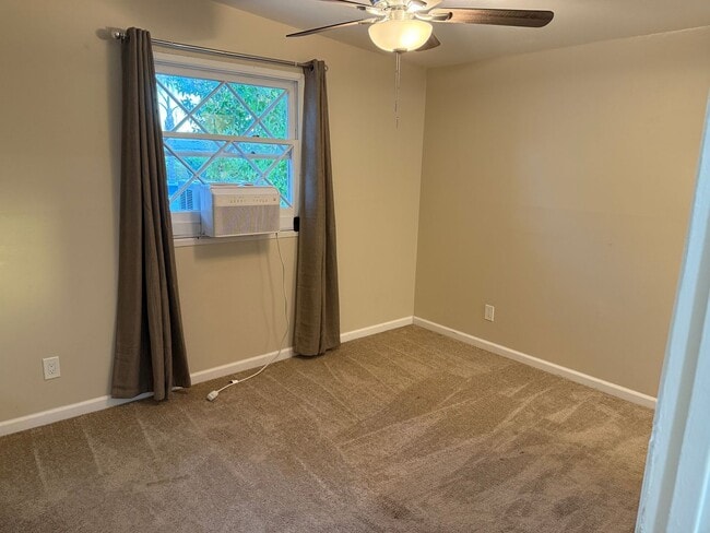 Building Photo - Updated 3BR/2BA home w/yard and garage in ...