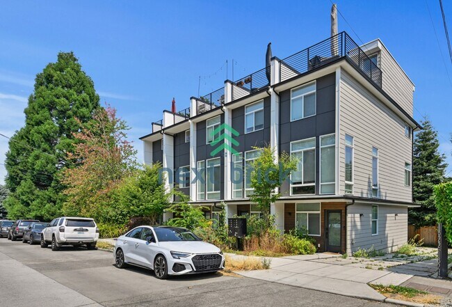 Building Photo - "Charming 3-Bedroom Townhouse Oasis in Heart of Seattle – Spacious 1460 Sq Ft with 2 Full Baths!"