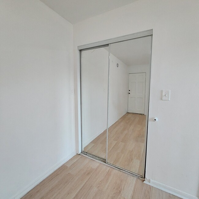 Walk-in closet pic #4 (full mirror doors) - 11938 Nava St