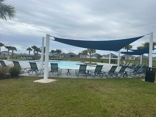 Building Photo - Brand New 4 bed inCypress Park - Haines City